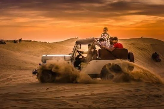 A short, fast run across the soft sand in a Thar. Ask for it when you book, because it is not part of the standard night.